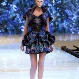 A model presents an outfit by British designer Alexander McQueen during ready-to-wear Spring-Summer 2010 fashion show on October 6, 2009 in Paris. AFP PHOTO FRANCOIS GUILLOT