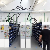 2-lego-designers_giant-lego-man-graphic-and-grass-print