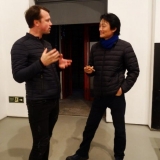 Dailininkas Rodionas Petrovas ir kuratorius Xin Dong Chengas. Remigijaus Treigio nuotr.